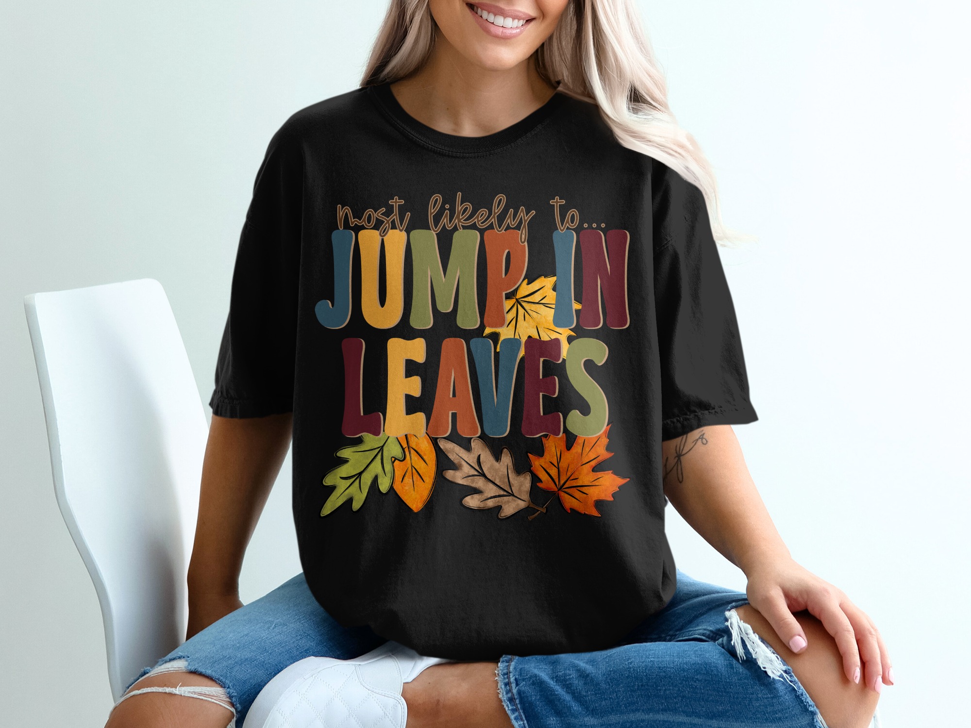 Most Likely To Jump In Leaves T Shirt, Fall Apparel, Autumn Shirt, Thanksgiving Tee, Funny Fall Shirt, Colorful Leaves T-Shirt - Image 2