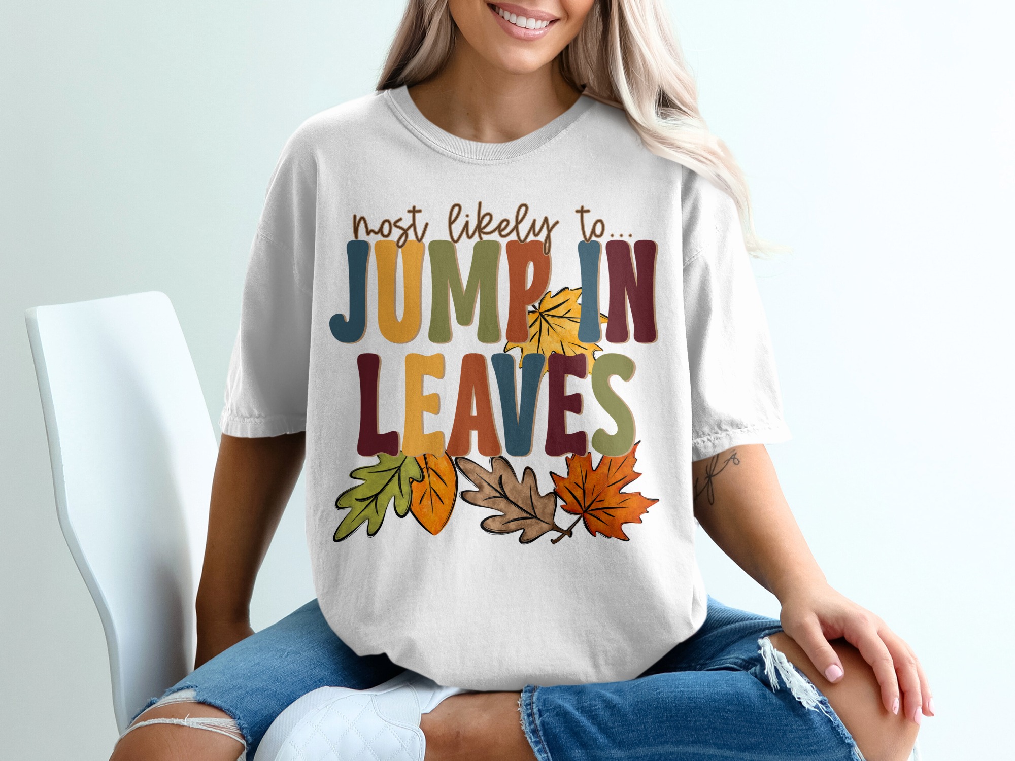 Most Likely To Jump In Leaves T Shirt, Fall Apparel, Autumn Shirt, Thanksgiving Tee, Funny Fall Shirt, Colorful Leaves T-Shirt