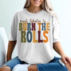 Most Likely To Burn The Rolls T-Shirt, Funny Thanksgiving Tee, Holiday Humor Gift, Family Gathering Apparel, Retro Style Shirt