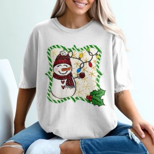 Christmas Snowman T-Shirt, Buffalo Plaid Hat Tee, Holiday Lights Shirt, Winter Gift for Her, Festive Apparel, Holiday Season T-Shirt