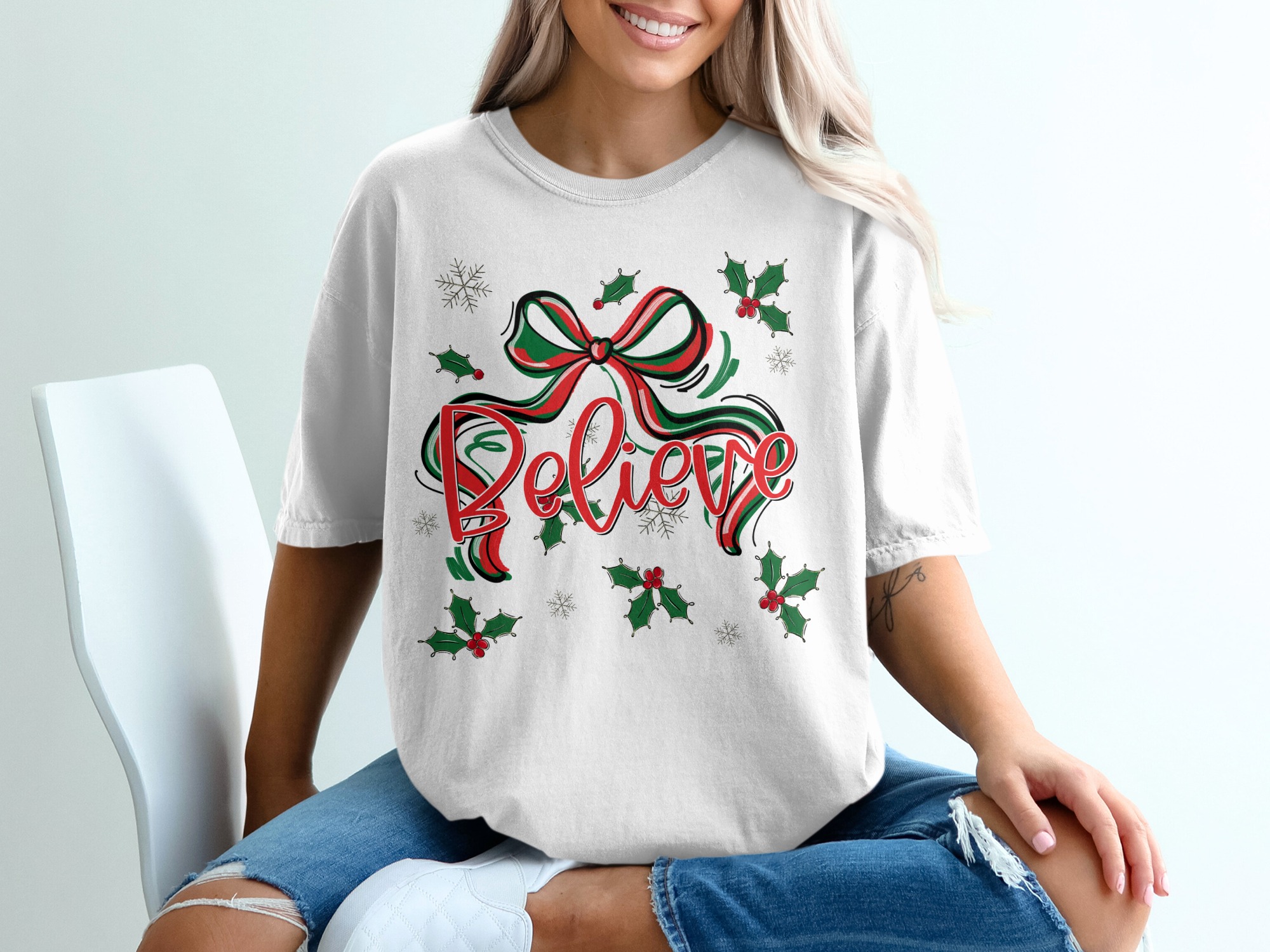 Believe Christmas T-Shirt, Holiday Cheer Shirt, Festive Graphic Tee, Xmas Ribbon Holly Design, Winter Snowflakes, Seasonal Gift Tee, Joyful