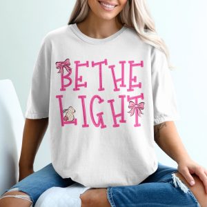 Be The Light T-Shirt, Christian Bunny Tee, Faith Based Inspirational Shirt for Women, Religious Gift Top, Uplifting Easter Apparel