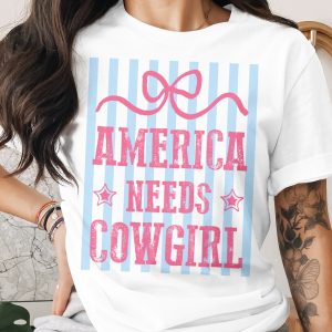 America Needs Cowgirl T-Shirt, Patriotic Western Graphic Tee, Distressed Pink Bow Shirt, Girly Americana Rodeo Top, Gift For Her