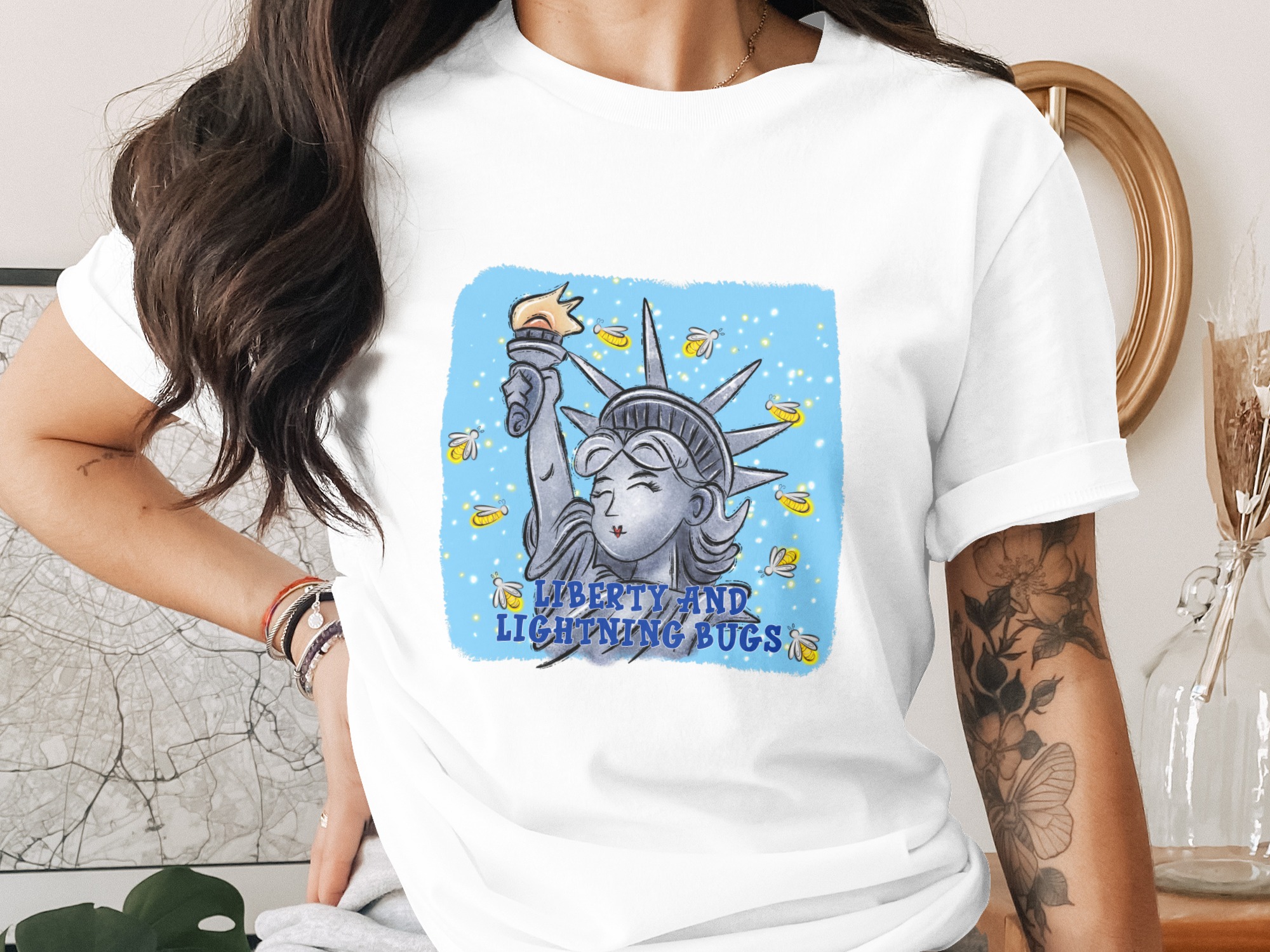 Liberty and Lightning Bugs T-Shirt, Whimsical Statue of Liberty Firefly Graphic Tee, Patriotic Summer Shirt Gift for Her