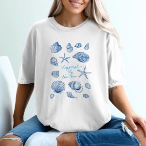 Happiest By The Sea Seashell T-Shirt, Comfort Colors Beach Lover Tee, Ocean Life Starfish Vacation Shirt, Coastal Gift for Her